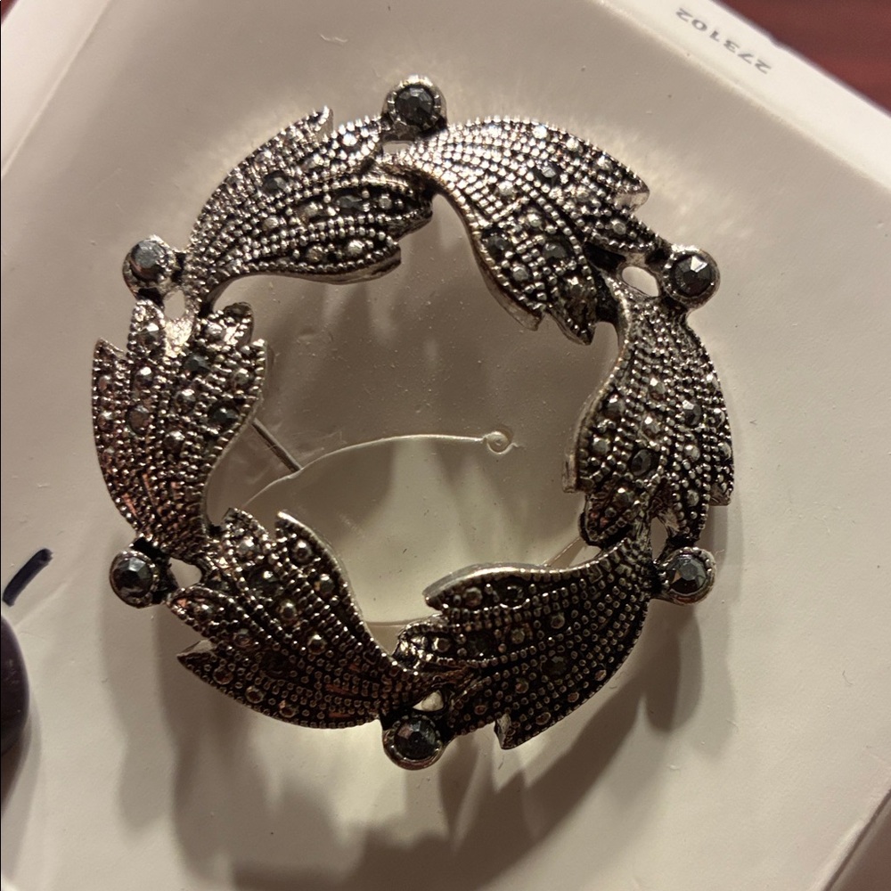 Elegant Silver Brooch with Gem Accents
